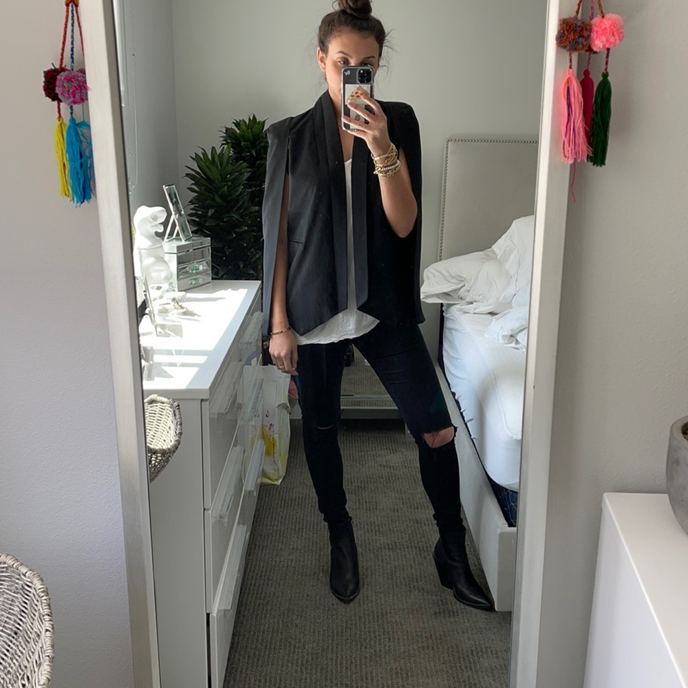 Never worn!! Black blazer/vest with shoulder pads